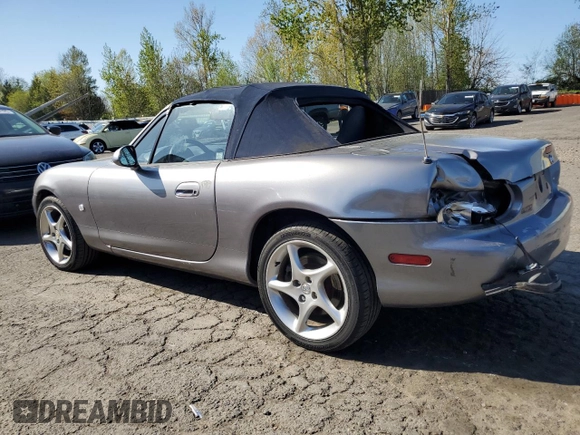 2003 Mazda MX-5 Miata Cloth with VIN JM1NB353430308653, listed as a Copart auction lot 53129865 with 144,549 mi miles and Salvage Title. Bid and sale history available at DreamBid. Image 2.