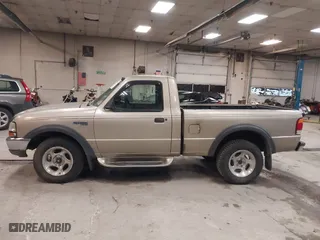 1999 Ford Ranger XLT with VIN 1FTYR11X0XTA72917, listed as a IAAI auction lot 41502156 with 106,585 mi miles. Bid and sale history available at carsss.com. Image 12.