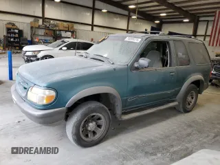 1998 Ford Explorer Sport z VIN 1FMYU22X4WUB36948, wystawiony jako Copart lot #76699374 z przebiegiem 266 977 mil mil oraz Szkoda całkowita • Salvage title. Historia ofert i sprzedaży dostępna na DreamBid. Obrazek 1.