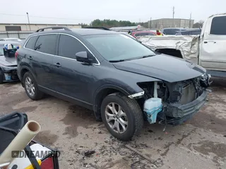 2014 Mazda CX-9 Touring with VIN JM3TB2CA1E0427984, listed as a IAAI auction lot 41620770 with 88,305 mi miles and . Bid and sale history available at DreamBid. Image 1.
