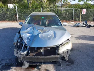 2015 Toyota Camry XLE with VIN 4T1BF1FK8FU106585, listed as a IAAI auction lot 41696231 with 149,390 mi miles. Bid and sale history available at carsss.com. Image 6.