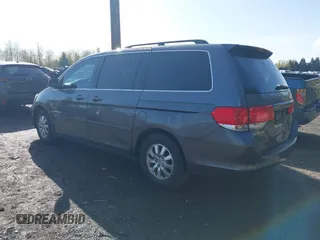 2010 Honda Odyssey EX-L with VIN 5FNRL3H67AB087262, listed as a IAAI auction lot 41999995 with 153,186 mi miles. Bid and sale history available at carsss.com. Image 3.