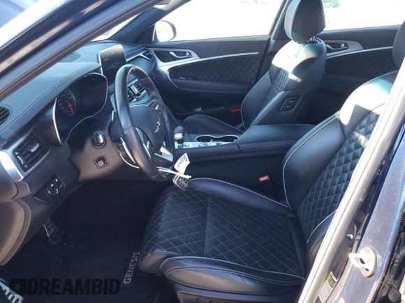 2019 Genesis G70 Dynamic with VIN KMTG34LE8KU032664, listed as a Copart auction lot 89106065 with 27,659 mi miles and Salvage Title. Bid and sale history available at DreamBid. Image 7.