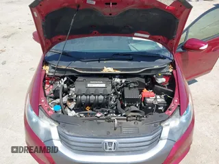 2010 Honda Insight EX with VIN JHMZE2H73AS009253, listed as a IAAI auction lot 41882569 with 104,839 mi miles and . Bid and sale history available at DreamBid. Image 10.