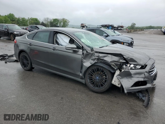 2014 Ford Fusion SE with VIN 3FA6P0HD0ER335320, listed as a Copart auction lot 53906695 with 113,519 mi miles and Salvage Title. Bid and sale history available at DreamBid. Image 4.
