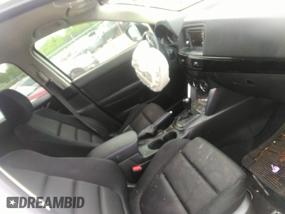 2014 Mazda CX-5 Touring z VIN JM3KE4CY0E0303748, wystawiony jako IAAI lot #42127406 z przebiegiem Nie podano mil oraz . Historia ofert i sprzedaży dostępna na DreamBid. Obrazek 5.