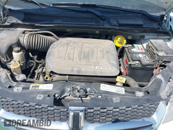 2015 Dodge Grand Caravan SE with VIN 2C4RDGBG9FR691462, listed as a IAAI auction lot 42197050 with 124,239 mi miles and . Bid and sale history available at DreamBid. Image 10.