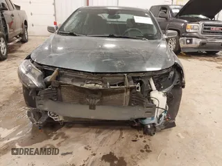 2020 Chevrolet Malibu LS with VIN 1G1ZB5ST1LF010715, listed as a IAAI auction lot 41553573 with 59,767 mi miles and . Bid and sale history available at DreamBid. Image 6.
