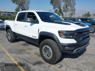 2022 Ram 1500 TRX with VIN 1C6SRFU93NN172647, listed as a IAAI auction lot 41539123 with 18,016 mi miles and . Bid and sale history available at DreamBid. Image 1.