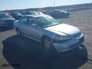 2002 Honda Accord Sdn SE with VIN 1HGCG66862A003976, listed as a IAAI auction lot 41824785 with 263098 miles. Bid and sale history available at carsss.com. Image 1.