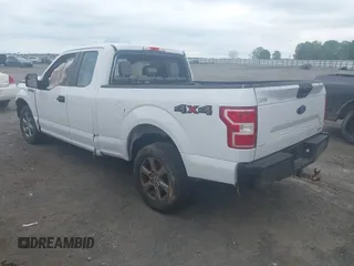 2018 Ford F-150 XL with VIN 1FTEX1EP1JKF66557, listed as a IAAI auction lot 42099567 with 126,516 mi miles and . Bid and sale history available at DreamBid. Image 3.