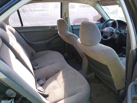 1997 Honda Civic EX with VIN 2HGEJ8645VH566736, listed as a IAAI auction lot 41876647 with 277,968 mi miles. Bid and sale history available at carsss.com. Image 8.