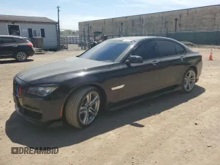 2014 BMW 7 Series 750i xDrive with VIN WBAYB6C52ED224536, listed as a Copart auction lot 54397595 with 107,410 mi miles and Salvage title. Bid and sale history available at DreamBid. Image 1.