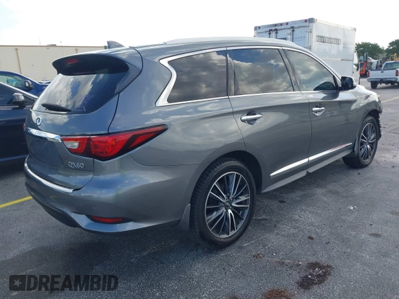 2016 Infiniti QX60 with VIN 5N1AL0MM1GC510760, listed as a IAAI auction lot 41990248 with 60,296 mi miles and . Bid and sale history available at DreamBid. Image 4.