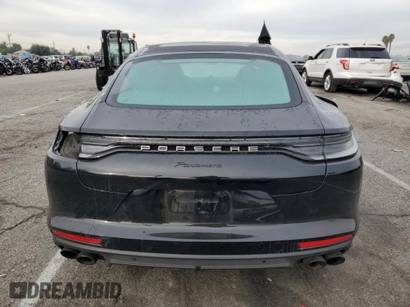 2022 Porsche Panamera z VIN WP0AJ2A79NL102055, wystawiony jako Copart lot #82739553 z przebiegiem 12 943 mil mil oraz . Historia ofert i sprzedaży dostępna na DreamBid. Obrazek 6.