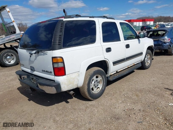 2005 Chevrolet Tahoe LS with VIN 1GNEK13T65J198121, listed as a IAAI auction lot 41826459 with 233,718 mi miles. Bid and sale history available at carsss.com. Image 4.