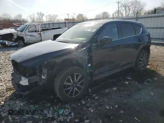 2017 Mazda CX-5 Grand Touring with VIN JM3KFBDL7H0202019, listed as a Copart auction lot 50617985 with 63,089 mi miles and Salvage Title. Bid and sale history available at carsss.com. Image 1.