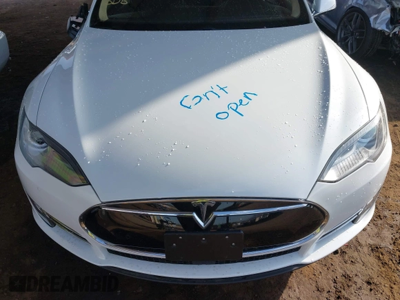 2014 Tesla Model S 60 with VIN 5YJSA1H14EFP63737, listed as a IAAI auction lot 41947610 with 62,240 mi miles and . Bid and sale history available at DreamBid. Image 10.