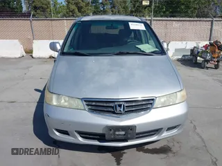 2002 Honda Odyssey EX z VIN 2HKRL186X2H513999, wystawiony jako IAAI lot #42348131 z przebiegiem 252 202 mil mil oraz . Historia ofert i sprzedaży dostępna na DreamBid. Obrazek 6.