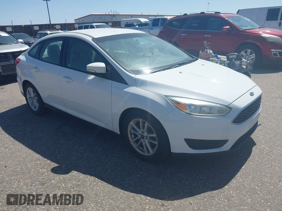 2015 Ford Focus SE z VIN 1FADP3F28FL334359, wystawiony jako IAAI lot #42520827 z przebiegiem 182 755 mil mil oraz . Historia ofert i sprzedaży dostępna na DreamBid. Obrazek 1.