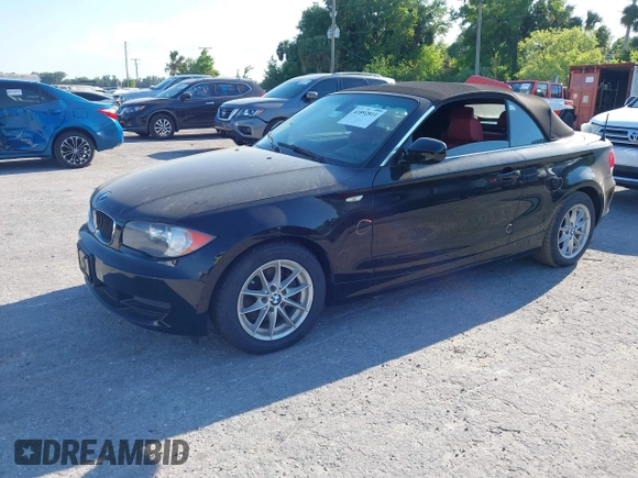 2011 BMW 1 Series 128i with VIN WBAUL7C55BVM81049, listed as a IAAI auction lot 41892811 with 50,659 mi miles and . Bid and sale history available at carsss.com. Image 18.