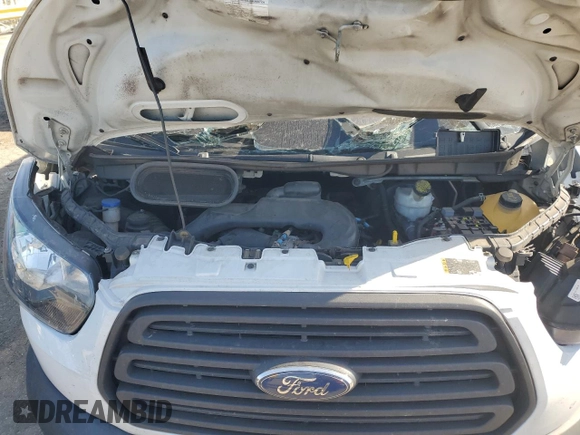 2018 Ford Transit z VIN 1FTYR1ZM3JKA37330, wystawiony jako Copart lot #72782594 z przebiegiem Nie podano mil oraz Szkoda całkowita • Salvage title. Historia ofert i sprzedaży dostępna na DreamBid. Obrazek 12.