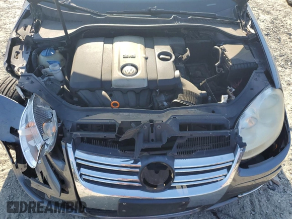 2006 Volkswagen Jetta z VIN 3VWDG71K26M673879, wystawiony jako Copart lot #75674634 z przebiegiem 93 689 mil mil oraz Szkoda całkowita • Salvage title. Historia ofert i sprzedaży dostępna na DreamBid. Obrazek 11.