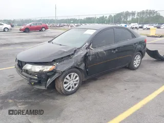 2012 Kia Forte EX with VIN KNAFU4A25C5623589, listed as a IAAI auction lot 42104501 with 273,270 mi miles. Bid and sale history available at carsss.com. Image 2.