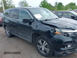 2016 Honda Pilot EX-L with VIN 5FNYF6H53GB070382, listed as a IAAI auction lot 39476567 with 83,741 mi miles and . Bid and sale history available at DreamBid. Image 13.