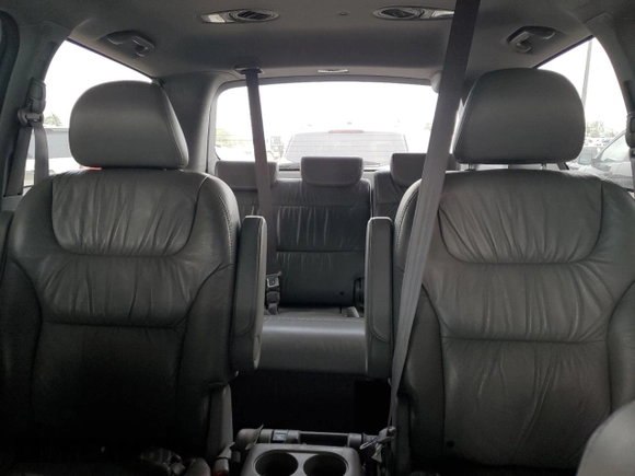 2010 Honda Odyssey EX-L с VIN 5FNRL3H74AB058939, выставлен на аукционе Copart как лот 55213935 с пробегом 175 906 миль миль и Списание • Salvage title. История ставок и продаж доступна на DreamBid. Изображение 10.