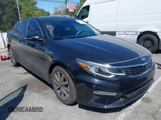 2019 Kia Optima LX with VIN 5XXGT4L34KG308177, listed as a IAAI auction lot 41919565 with 57,815 mi miles. Bid and sale history available at carsss.com. Image 1.