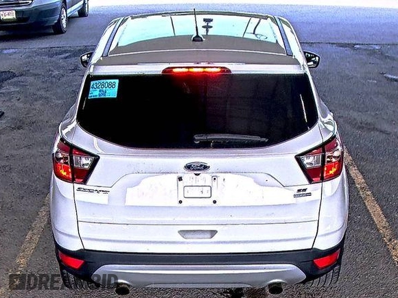 2017 Ford Escape SE z VIN 1FMCU9GD0HUD44281, wystawiony jako IAAI lot #42573170 z przebiegiem 99 085 mil mil oraz . Historia ofert i sprzedaży dostępna na DreamBid. Obrazek 23.