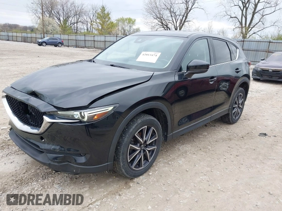 2018 Mazda CX-5 Grand Touring with VIN JM3KFBDM3J0384431, listed as a IAAI auction lot 42013474 with 65,018 mi miles. Bid and sale history available at carsss.com. Image 21.