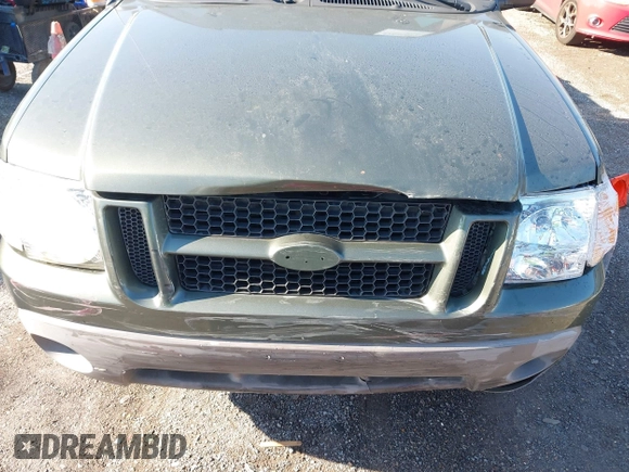2001 Ford Explorer Sport Trac z VIN 1FMZU67E61UC97894, wystawiony jako IAAI lot #42636012 z przebiegiem 167 633 mil mil oraz . Historia ofert i sprzedaży dostępna na DreamBid. Obrazek 6.
