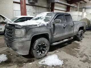 2017 GMC Sierra 1500 SLT z VIN 1GTV2NEC2HZ176037, wystawiony jako Copart lot #89107335 z przebiegiem 163 795 mil mil oraz Szkody całkowita. Historia ofert i sprzedaży dostępna na DreamBid. Obrazek 1.