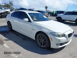 2012 BMW 5 Series 528i with VIN WBAXG5C58CDW93988, listed as a IAAI auction lot 41802298 with 75,745 mi miles. Bid and sale history available at carsss.com. Image 1.
