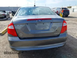 2012 Ford Fusion SE z VIN 3FAHP0HG0CR436745, wystawiony jako IAAI lot #41598812 z przebiegiem 116 305 mil mil oraz . Historia ofert i sprzedaży dostępna na DreamBid. Obrazek 17.