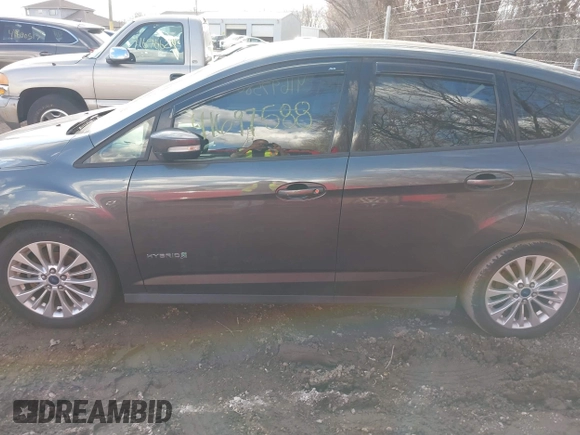 2017 Ford C-Max SE z VIN 1FADP5AU9HL108743, wystawiony jako IAAI lot #41697588 z przebiegiem 188 856 mil mil oraz . Historia ofert i sprzedaży dostępna na DreamBid. Obrazek 14.
