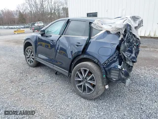 2018 Mazda CX-5 Grand Touring with VIN JM3KFBDM5J0313103, listed as a IAAI auction lot 35896676 with 43,918 mi miles. Bid and sale history available at carsss.com. Image 3.