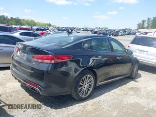 2016 Kia Optima SXL Turbo with VIN 5XXGV4L23GG117486, listed as a IAAI auction lot 41998300 with 142,477 mi miles. Bid and sale history available at carsss.com. Image 13.