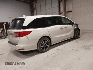 2018 Honda Odyssey Elite with VIN 5FNRL6H94JB034739, listed as a IAAI auction lot 41242506 with 96,982 mi miles and . Bid and sale history available at DreamBid. Image 4.