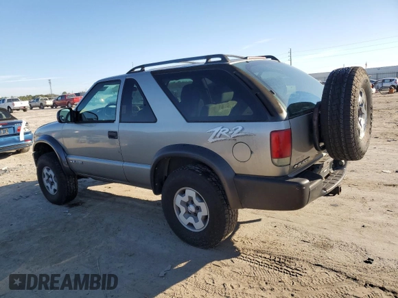 2004 Chevrolet Blazer LS z VIN 1GNCT18X94K116116, wystawiony jako Copart lot #42378015 z przebiegiem 112 272 mil mil oraz Czysty tytuł • Clean title. Historia ofert i sprzedaży dostępna na DreamBid. Obrazek 2.