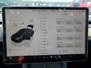 2022 Tesla Model 3 with VIN 5YJ3E1EAXNF286180, listed as a Copart auction lot 52299105 with 129,824 mi miles and Clean Title. Bid and sale history available at carsss.com. Image 9.