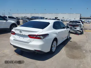 2023 Toyota Camry LE z VIN 4T1C11AKXPU804367, wystawiony jako IAAI lot #42019545 z przebiegiem 23 737 mil mil oraz . Historia ofert i sprzedaży dostępna na DreamBid. Obrazek 4.
