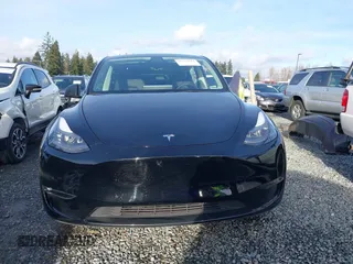 2022 Tesla Model Y Performance with VIN 7SAYGDEF0NF406262, listed as a IAAI auction lot 41132514 with 27,171 mi miles. Bid and sale history available at carsss.com. Image 13.