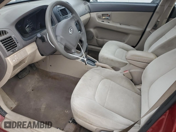 2008 Kia Spectra EX with VIN KNAFE121985532558, listed as a Copart auction lot 57984805 with 136,964 mi miles and Salvage title. Bid and sale history available at DreamBid. Image 7.