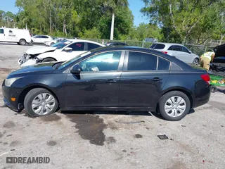 2014 Chevrolet Cruze LS with VIN 1G1PA5SH1E7181211, listed as a IAAI auction lot 41850676 with 128,893 mi miles. Bid and sale history available at carsss.com. Image 14.