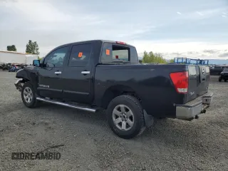 2012 Nissan Titan SV with VIN 1N6BA0ED3CN305384, listed as a Copart auction lot 56497905 with 331,174 mi miles and Salvage title. Bid and sale history available at DreamBid. Image 2.
