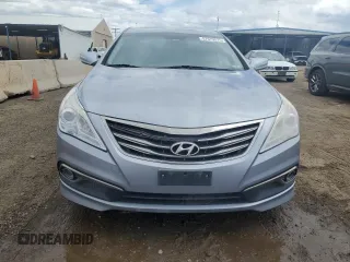 2015 Hyundai Azera z VIN KMHFG4JG7FA439963, wystawiony jako Copart lot #57679575 z przebiegiem 200 379 mil mil oraz Czysty tytuł • Clean title. Historia ofert i sprzedaży dostępna na DreamBid. Obrazek 5.