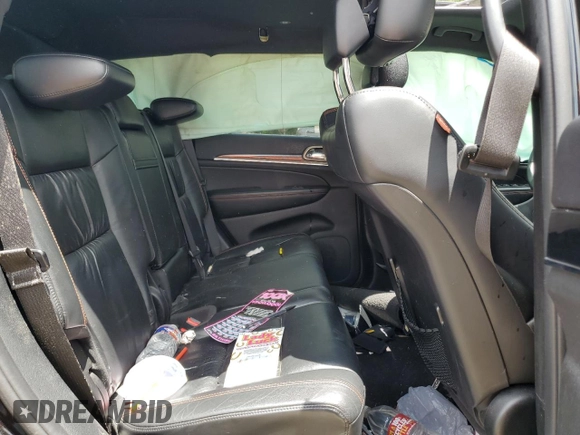 2016 Jeep Grand Cherokee Limited 75th Anniversary with VIN 1C4RJEBG0GC476544, listed as a Copart auction lot 56539365 with 95,989 mi miles and Salvage title. Bid and sale history available at DreamBid. Image 11.
